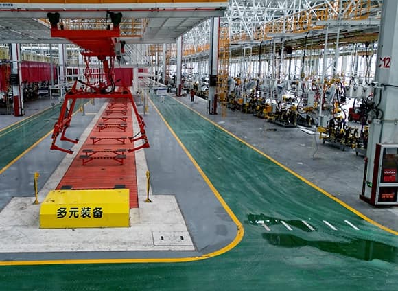 Automotive welding and assembly equipment inside a vehicle plant